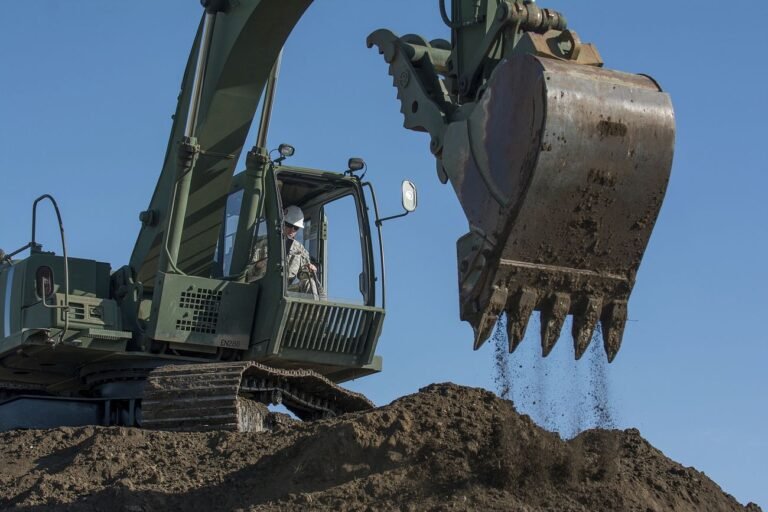 US soldier using excavator