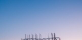 photo of people on building under construction