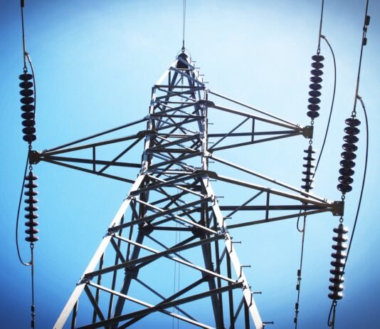 low angle view of electric post