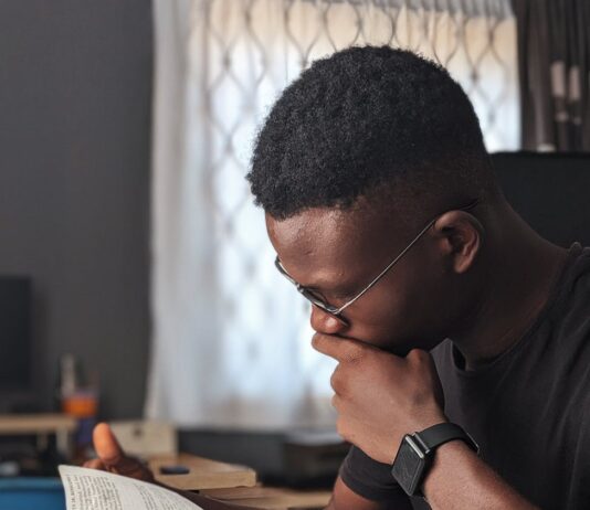 man reading a book