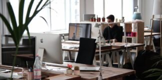 man sitting in front of computer
