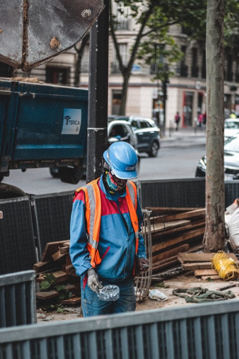man working on construction object in modern city
