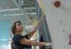 a woman doing wall climbing