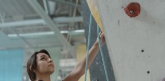 a woman doing wall climbing