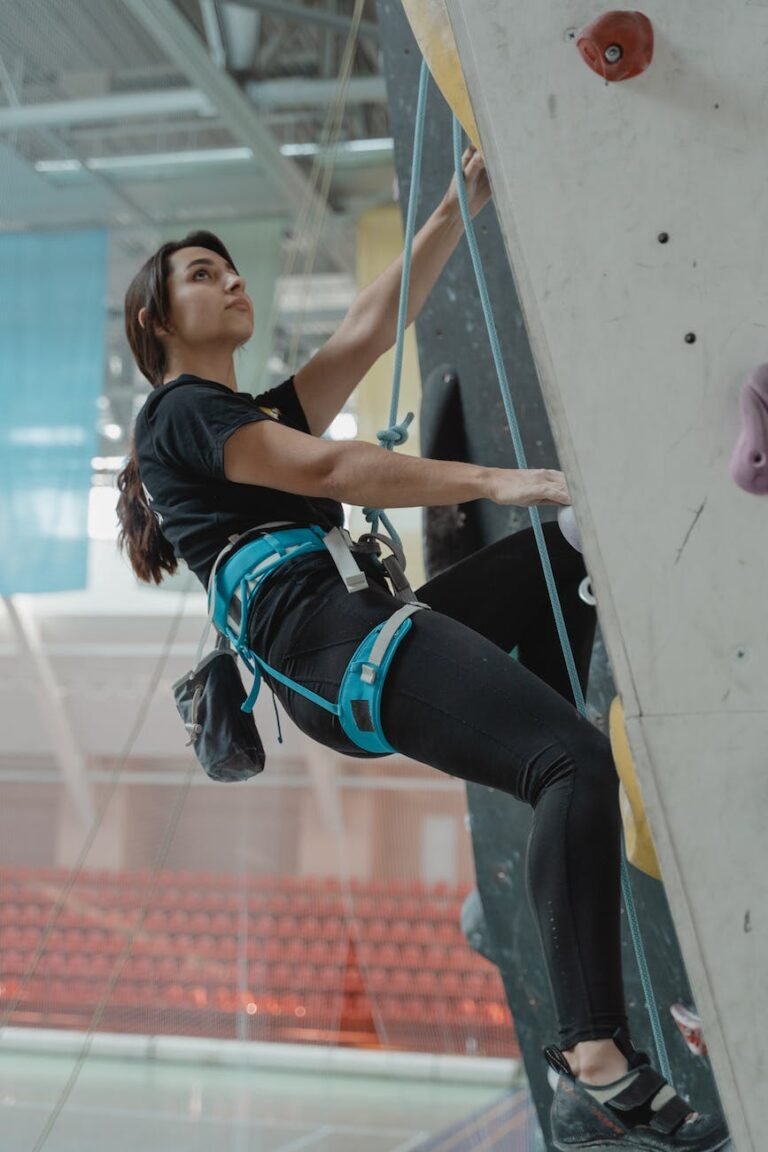 a woman doing wall climbing