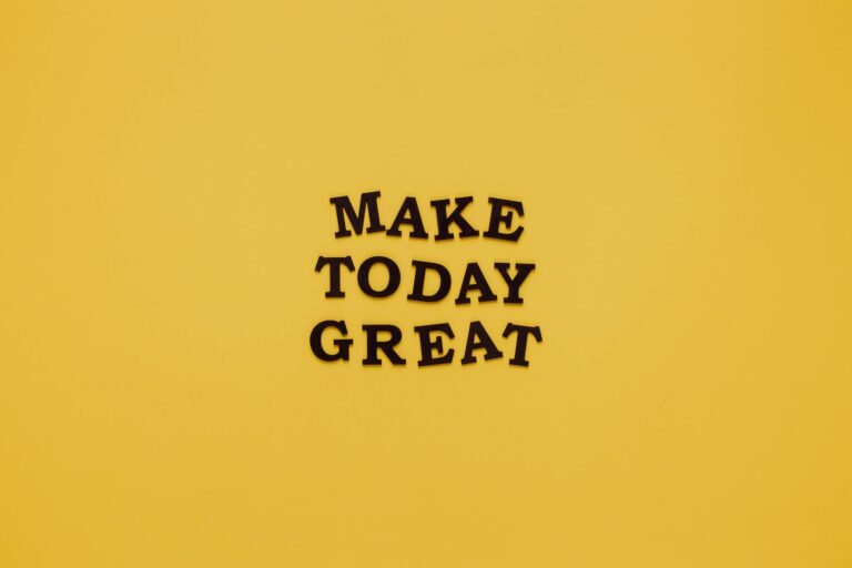 motivational quote on yellow background