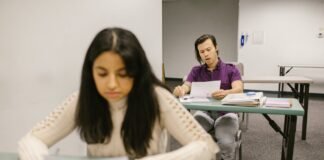 student looking at his test result