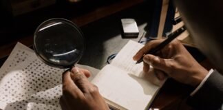 photo of person taking down notes