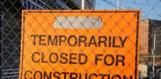 barb wires barrier billboard building
