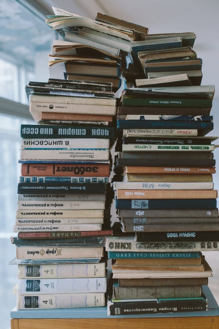 books piled up on the table