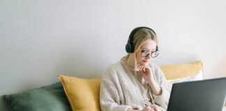 photo of woman taking notes