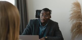 man talking to an applying woman