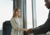 female candidate doing hand shakes