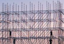 photo of people on building under construction
