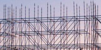 photo of people on building under construction