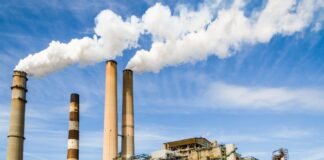 photo of an industrial factory emitting smoke