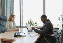 man interviewing the woman