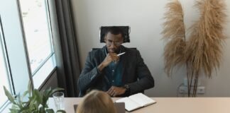 man interviewing the woman applying for job