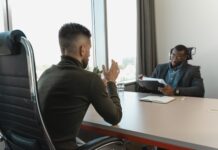 businessman looking at employee