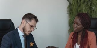 man reviewing woman s resume