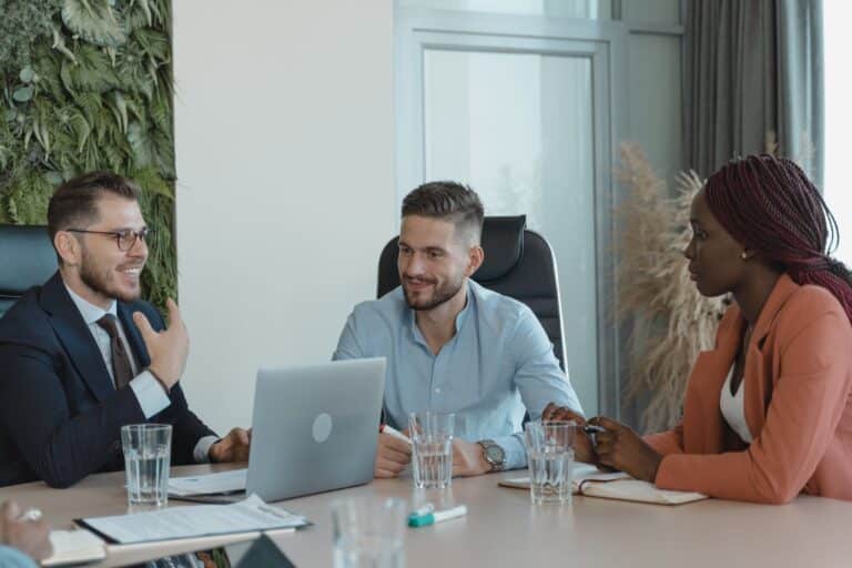 coworkers in a conference room having a meeting