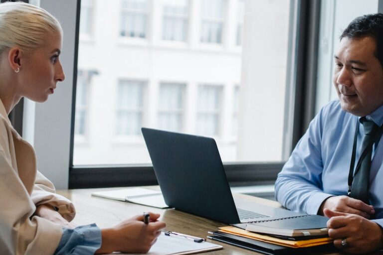 professional man interviewing an applicant