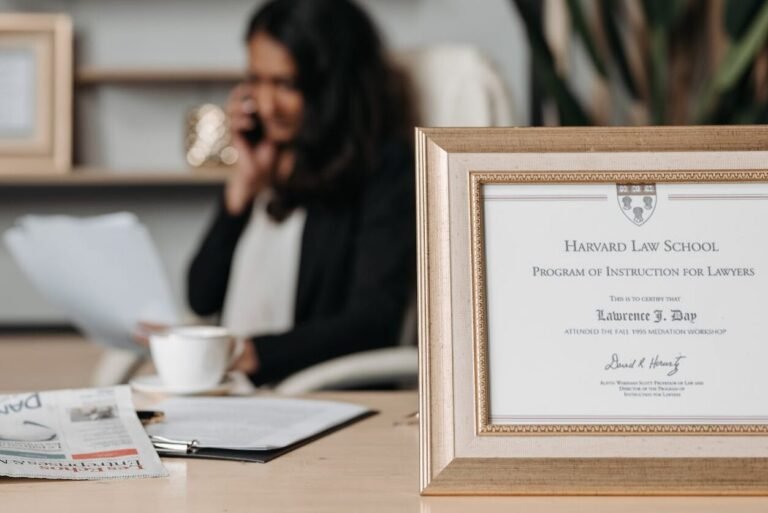 selective focus photo of a diploma on a frame