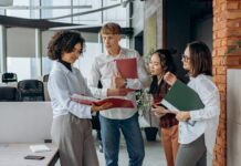 business colleagues reading documents in the office