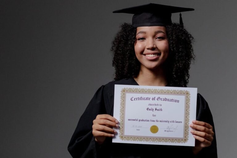 woman holding a diploma