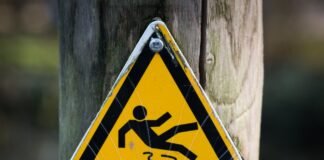 sign slippery wet caution