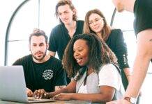 woman sharing her presentation with her colleagues