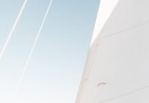 photo of sailboat on sea during daytime