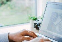 man using dell laptop