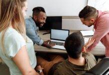 group of people having discussion at work
