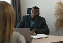 man talking to an applying woman