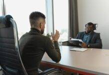 businessman looking at employee