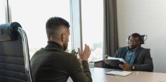 businessman looking at employee