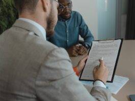 man reading a contract