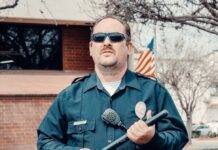 policeman holding a baton