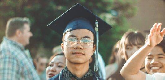 photo of a man wearing academic dress