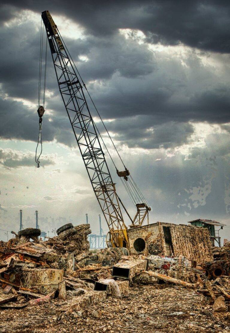 abandoned scrap yard under cloudy sky