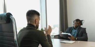businessman looking at employee