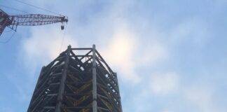 Steelworkers and Space Launch System Structural Test Stand Climb to New Heights
