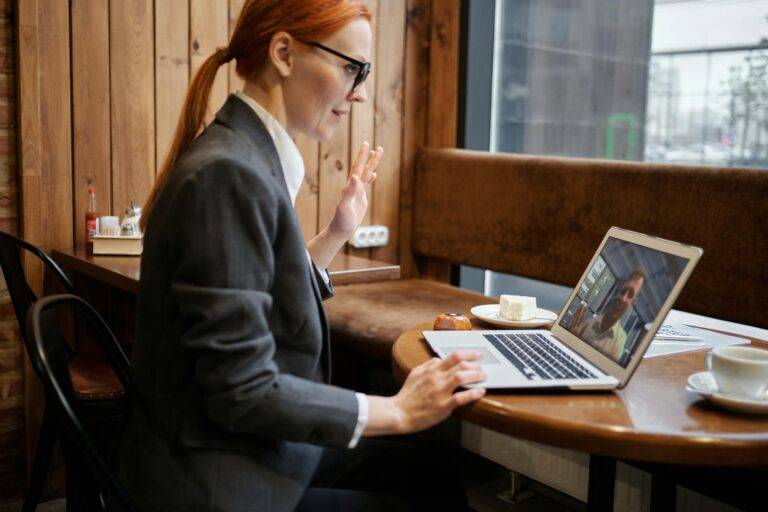 woman saying hello on online meeting
