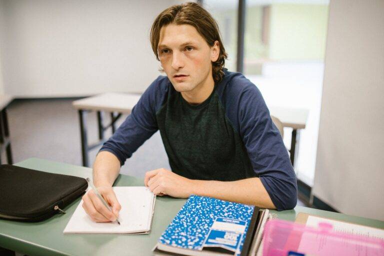 man studying inside the classroom