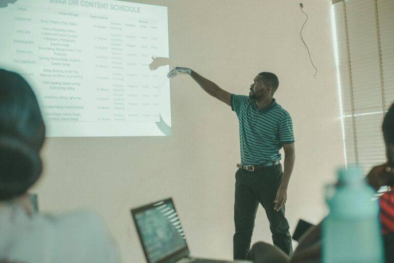 man showing a graph in a classroom