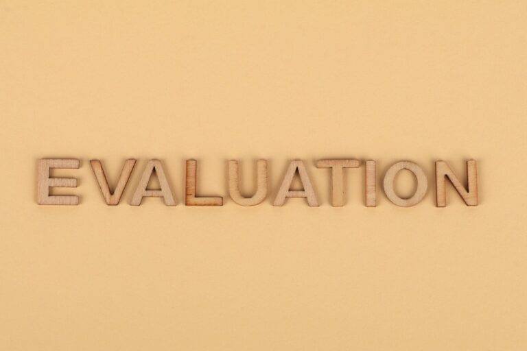 the word evaluation from wooden letters