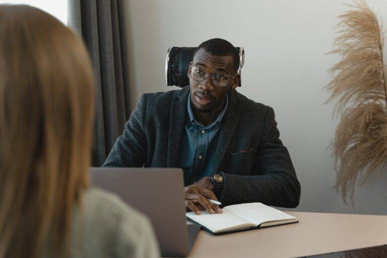 man talking to an applying woman