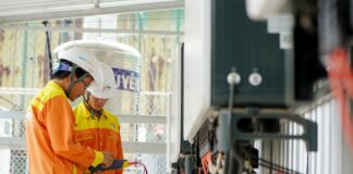 men working with electrical wires