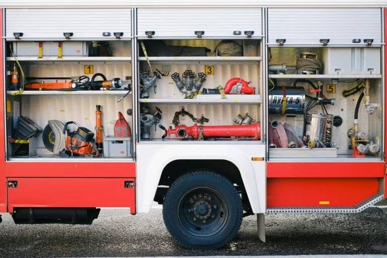 firefighter tools and equipment inside a fire truck